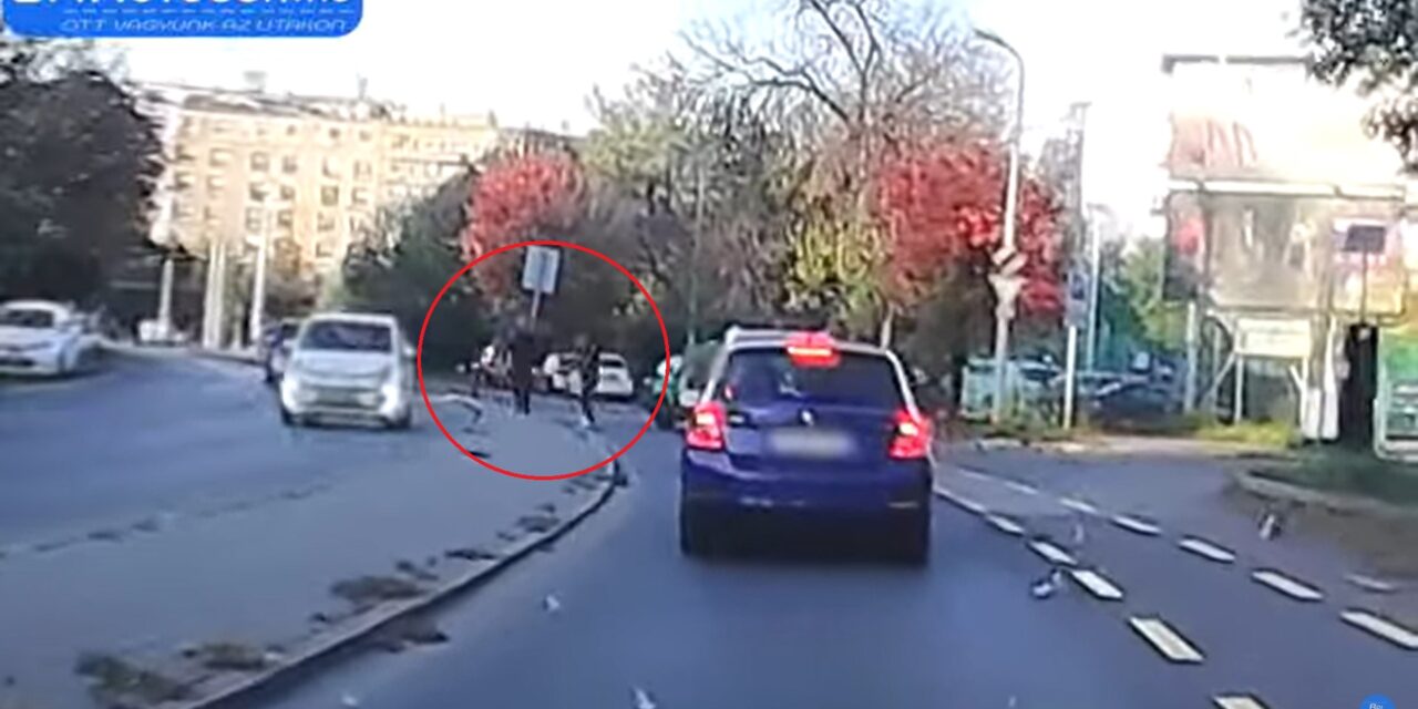 Videóval: Kipattant az autójából a futár, majd összeverekedett egy gyalogossal fényes nappal a Bogdánfy úton